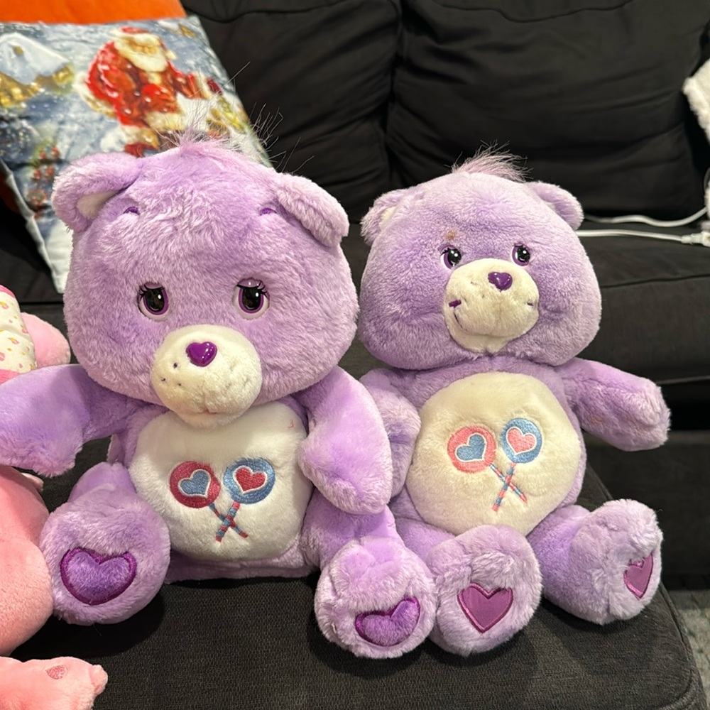 2 purple loli pop care bears